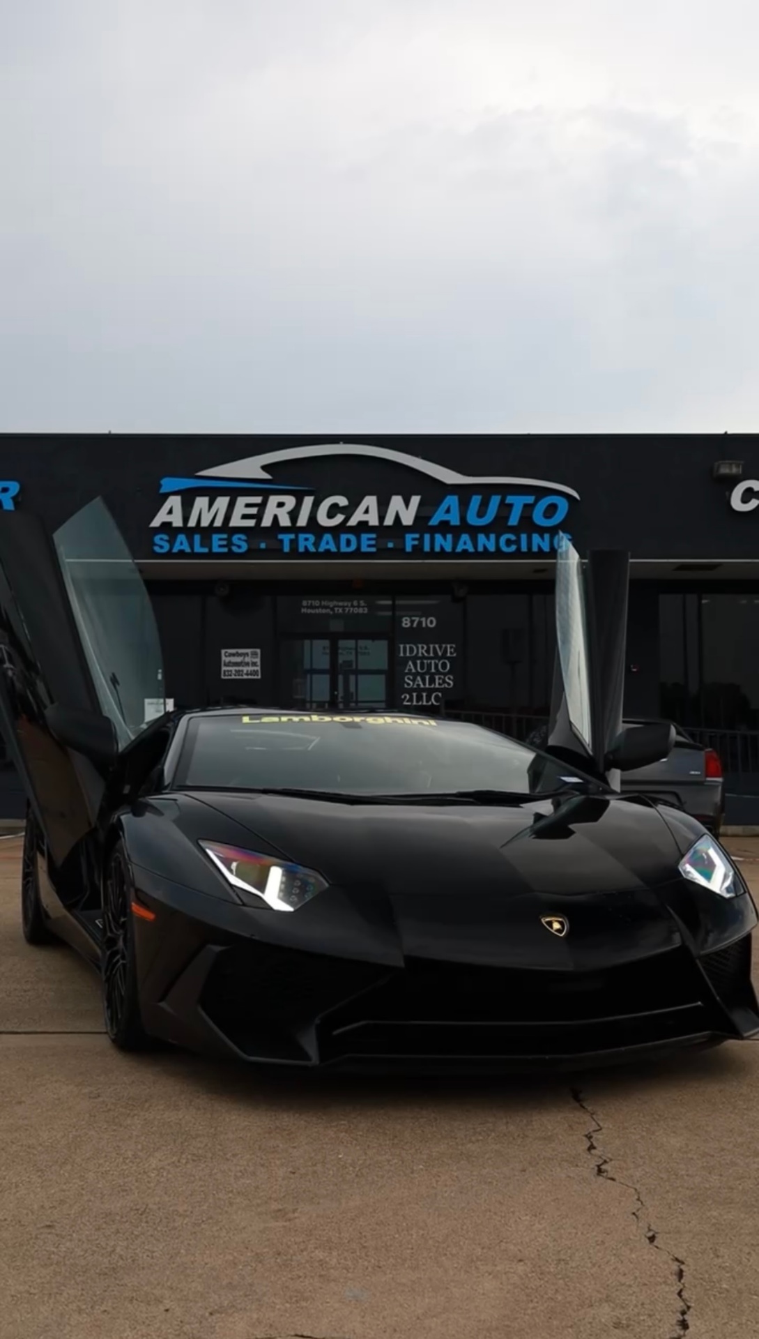 American Auto Houston shop and vehicles