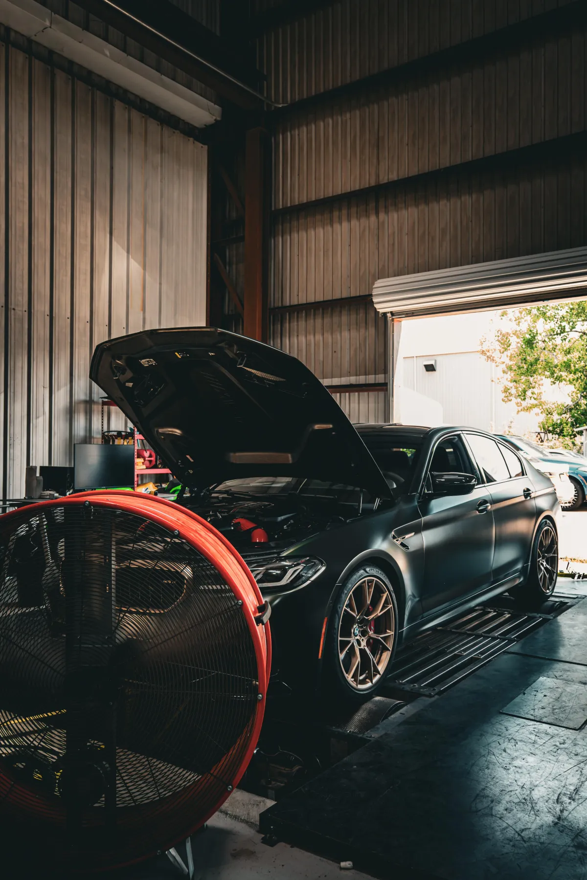 American Auto Houston shop and vehicles